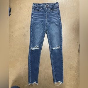 American Eagle Super High Rise Jeggings distressed.